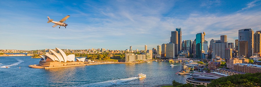 A seaplane flying over Sydney