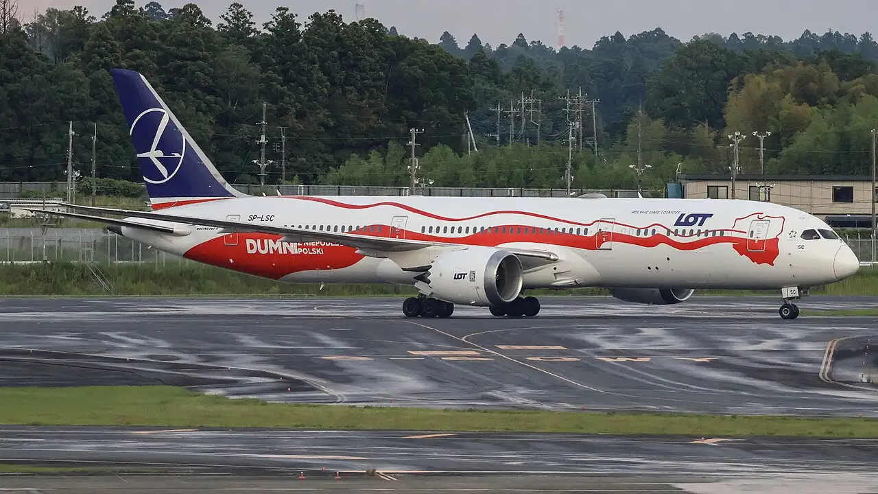 LOT Polish Airlines Boeing 787-9 Dreamliner SP-LSC in the red and white 'Dumni z Niepodległej' livery taxiing at an airport