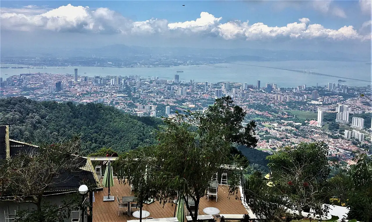 View from Penang Hill over George Town, the Penang Strait and the Penang Bridge on a sunny day